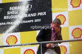 David Coulthard (GBR) Red Bull Racing and Scuderia Toro Advisor / BBC Television Commentator gets a champagne soaking on the podium. 25.08.2013. Formula 1 World Championship, Rd 11, Belgian Grand Prix, Spa Francorchamps, Belgium, Race Day.