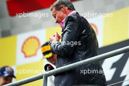 David Coulthard (GBR) Red Bull Racing and Scuderia Toro Advisor / BBC Television Commentator gets a champagne soaking on the podium. 25.08.2013. Formula 1 World Championship, Rd 11, Belgian Grand Prix, Spa Francorchamps, Belgium, Race Day.