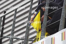 Greenpeace make a protest against race title sponsors Shell at the podium. 25.08.2013. Formula 1 World Championship, Rd 11, Belgian Grand Prix, Spa Francorchamps, Belgium, Race Day.