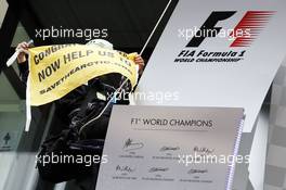 Greenpeace make a protest against race title sponsors Shell at the podium. 25.08.2013. Formula 1 World Championship, Rd 11, Belgian Grand Prix, Spa Francorchamps, Belgium, Race Day.