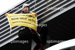 Greenpeace make a protest against race title sponsors Shell at the podium. 25.08.2013. Formula 1 World Championship, Rd 11, Belgian Grand Prix, Spa Francorchamps, Belgium, Race Day.