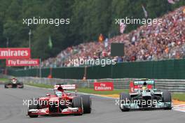 Fernando Alonso (ESP) Ferrari F138 and Lewis Hamilton (GBR) Mercedes AMG F1 W04 battle for position. 25.08.2013. Formula 1 World Championship, Rd 11, Belgian Grand Prix, Spa Francorchamps, Belgium, Race Day.