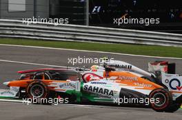 Sergio Perez (MEX) McLaren MP4-28 and Paul di Resta (GBR) Sahara Force India VJM06 battle for position. 25.08.2013. Formula 1 World Championship, Rd 11, Belgian Grand Prix, Spa Francorchamps, Belgium, Race Day.