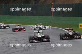 (L to R): Esteban Gutierrez (MEX) Sauber C32 and Kimi Raikkonen (FIN) Lotus F1 E21 battle for position. 25.08.2013. Formula 1 World Championship, Rd 11, Belgian Grand Prix, Spa Francorchamps, Belgium, Race Day.