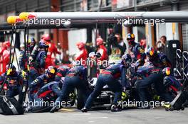 Mark Webber (AUS) Red Bull Racing RB9 makes a pit stop. 25.08.2013. Formula 1 World Championship, Rd 11, Belgian Grand Prix, Spa Francorchamps, Belgium, Race Day.