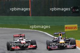 (L to R): Jenson Button (GBR) McLaren MP4-28 and Sebastian Vettel (GER) Red Bull Racing RB9. 25.08.2013. Formula 1 World Championship, Rd 11, Belgian Grand Prix, Spa Francorchamps, Belgium, Race Day.