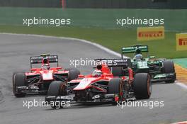 Jules Bianchi (FRA) Marussia F1 Team MR02 leads team mate Max Chilton (GBR) Marussia F1 Team MR02 and Charles Pic (FRA) Caterham CT03. 25.08.2013. Formula 1 World Championship, Rd 11, Belgian Grand Prix, Spa Francorchamps, Belgium, Race Day.