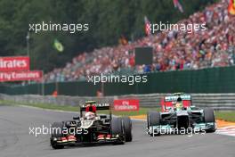 Romain Grosjean (FRA) Lotus F1 E21 and Lewis Hamilton (GBR) Mercedes AMG F1 W04. 25.08.2013. Formula 1 World Championship, Rd 11, Belgian Grand Prix, Spa Francorchamps, Belgium, Race Day.