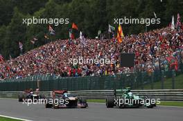 Giedo van der Garde (NLD) Caterham CT03 and Jean-Eric Vergne (FRA) Scuderia Toro Rosso STR8. 25.08.2013. Formula 1 World Championship, Rd 11, Belgian Grand Prix, Spa Francorchamps, Belgium, Race Day.