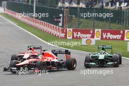 Jules Bianchi (FRA) Marussia F1 Team MR02 leads Charles Pic (FRA) Caterham CT03 and Max Chilton (GBR) Marussia F1 Team MR02. 25.08.2013. Formula 1 World Championship, Rd 11, Belgian Grand Prix, Spa Francorchamps, Belgium, Race Day.