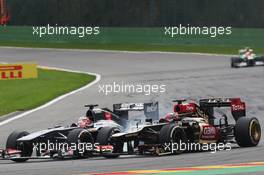 Nico Hulkenberg (GER) Sauber C32 and Kimi Raikkonen (FIN) Lotus F1 E21 battle for position. 25.08.2013. Formula 1 World Championship, Rd 11, Belgian Grand Prix, Spa Francorchamps, Belgium, Race Day.