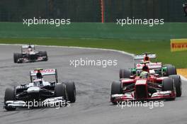 (L to R): Valtteri Bottas (FIN) Williams FW35 and Felipe Massa (BRA) Ferrari F138 battle for position. 25.08.2013. Formula 1 World Championship, Rd 11, Belgian Grand Prix, Spa Francorchamps, Belgium, Race Day.