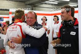 Max Chilton (GBR) Marussia F1 Team celebrates reaching Q2 with his father Grahame Chilton (GBR) and brother Tom Chilton (GBR) WTCC Driver. 24.08.2013. Formula 1 World Championship, Rd 11, Belgian Grand Prix, Spa Francorchamps, Belgium, Qualifying Day.