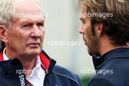 (L to R): Dr Helmut Marko (AUT) Red Bull Motorsport Consultant with Jean-Eric Vergne (FRA) Scuderia Toro Rosso. 24.08.2013. Formula 1 World Championship, Rd 11, Belgian Grand Prix, Spa Francorchamps, Belgium, Qualifying Day.