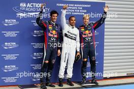 Qualifying parc ferme (L to R): Mark Webber (AUS) Red Bull Racing, third; Lewis Hamilton (GBR) Mercedes AMG F1, pole position; Sebastian Vettel (GER) Red Bull Racing, second. 24.08.2013. Formula 1 World Championship, Rd 11, Belgian Grand Prix, Spa Francorchamps, Belgium, Qualifying Day.