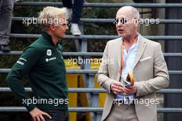 (L to R): Heikki Kovalainen (FIN) Caterham F1 Team Reserve Driver with Gary Harstein (USA) Former FIA Doctor. 24.08.2013. Formula 1 World Championship, Rd 11, Belgian Grand Prix, Spa Francorchamps, Belgium, Qualifying Day.