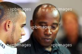 (L to R): Lewis Hamilton (GBR) Mercedes AMG F1 with his father Anthony Hamilton (GBR). 24.08.2013. Formula 1 World Championship, Rd 11, Belgian Grand Prix, Spa Francorchamps, Belgium, Qualifying Day.