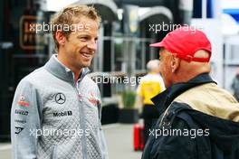 (L to R): Jenson Button (GBR) McLaren with Niki Lauda (AUT) Mercedes Non-Executive Chairman. 24.08.2013. Formula 1 World Championship, Rd 11, Belgian Grand Prix, Spa Francorchamps, Belgium, Qualifying Day.