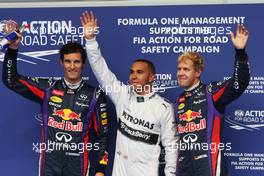 Qualifying parc ferme (L to R): Mark Webber (AUS) Red Bull Racing, third; Lewis Hamilton (GBR) Mercedes AMG F1, pole position; Sebastian Vettel (GER) Red Bull Racing, second. 24.08.2013. Formula 1 World Championship, Rd 11, Belgian Grand Prix, Spa Francorchamps, Belgium, Qualifying Day.