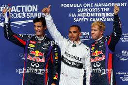 Qualifying parc ferme (L to R): Mark Webber (AUS) Red Bull Racing, third; Lewis Hamilton (GBR) Mercedes AMG F1, pole position; Sebastian Vettel (GER) Red Bull Racing, second. 24.08.2013. Formula 1 World Championship, Rd 11, Belgian Grand Prix, Spa Francorchamps, Belgium, Qualifying Day.