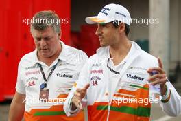 Adrian Sutil (GER) Sahara Force India F1 with Otmar Szafnauer (USA) Sahara Force India F1 Chief Operating Officer. 25.08.2013. Formula 1 World Championship, Rd 11, Belgian Grand Prix, Spa Francorchamps, Belgium, Race Day.