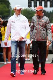 (L to R): Paul di Resta (GBR) Sahara Force India F1 and Jenson Button (GBR) McLaren on the drivers parade. 25.08.2013. Formula 1 World Championship, Rd 11, Belgian Grand Prix, Spa Francorchamps, Belgium, Race Day.