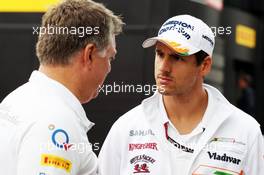 (L to R): Otmar Szafnauer (USA) Sahara Force India F1 Chief Operating Officer with Adrian Sutil (GER) Sahara Force India F1. 25.08.2013. Formula 1 World Championship, Rd 11, Belgian Grand Prix, Spa Francorchamps, Belgium, Race Day.