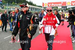 (L to R): Kimi Raikkonen (FIN) Lotus F1 Team and Fernando Alonso (ESP) Ferrari on the drivers parade. 25.08.2013. Formula 1 World Championship, Rd 11, Belgian Grand Prix, Spa Francorchamps, Belgium, Race Day.