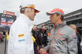 (L to R): Paul di Resta (GBR) Sahara Force India F1 and Jenson Button (GBR) McLaren on the drivers parade. 25.08.2013. Formula 1 World Championship, Rd 11, Belgian Grand Prix, Spa Francorchamps, Belgium, Race Day.