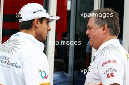 (L to R): Adrian Sutil (GER) Sahara Force India VJM06 with Otmar Szafnauer (USA) Sahara Force India F1 Chief Operating Officer. 25.08.2013. Formula 1 World Championship, Rd 11, Belgian Grand Prix, Spa Francorchamps, Belgium, Race Day.