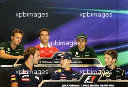 Jean-Eric Vergne (FRA), Scuderia Toro Rosso , Sebastian Vettel (GER), Red Bull Racing and Romain Grosjean (FRA), Lotus F1 Team at the press conference. 22.08.2013. Formula 1 World Championship, Rd 11, Belgian Grand Prix, Spa Francorchamps, Belgium, Preparation Day.