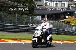 Esteban Gutierrez (MEX) Sauber rides the circuit on a moped. 22.08.2013. Formula 1 World Championship, Rd 11, Belgian Grand Prix, Spa Francorchamps, Belgium, Preparation Day.