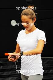Jessica Michibata (JPN), girlfriend of Jenson Button (GBR) McLaren. 22.08.2013. Formula 1 World Championship, Rd 11, Belgian Grand Prix, Spa Francorchamps, Belgium, Preparation Day.