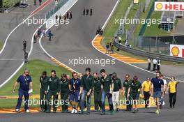 Alexander Rossi (USA) Caterham F1 Reserve Driver and Charles Pic (FRA) Caterham walk the circuit. 22.08.2013. Formula 1 World Championship, Rd 11, Belgian Grand Prix, Spa Francorchamps, Belgium, Preparation Day.