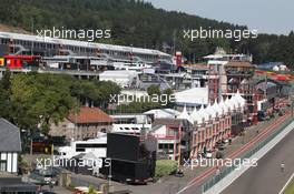 The old pits with the new paddock behind. 22.08.2013. Formula 1 World Championship, Rd 11, Belgian Grand Prix, Spa Francorchamps, Belgium, Preparation Day.