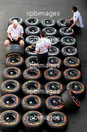 McLaren Mercedes mechanics, Pirelli tires  22.08.2013. Formula 1 World Championship, Rd 11, Belgian Grand Prix, Spa Francorchamps, Belgium, Preparation Day.