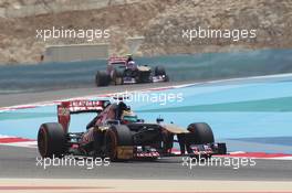 Jean-Eric Vergne (FRA) Scuderia Toro Rosso STR8 leads team mate Daniel Ricciardo (AUS) Scuderia Toro Rosso STR8. 19.04.2013. Formula 1 World Championship, Rd 4, Bahrain Grand Prix, Sakhir, Bahrain, Practice Day