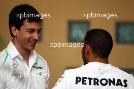 (L to R): Toto Wolff (GER) Mercedes AMG F1 Shareholder and Executive Director with Lewis Hamilton (GBR) Mercedes AMG F1. 19.04.2013. Formula 1 World Championship, Rd 4, Bahrain Grand Prix, Sakhir, Bahrain, Practice Day