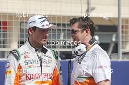 (L to R): Adrian Sutil (GER) Sahara Force India F1 with Bradley Joyce (GBR) Sahara Force India F1 Race Engineer on the grid. 21.04.2013. Formula 1 World Championship, Rd 4, Bahrain Grand Prix, Sakhir, Bahrain, Race Day