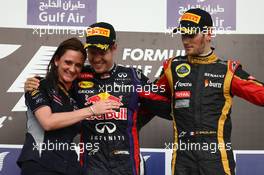 Gill Jones, Red Bull Racing with Sebastian Vettel (GER) Red Bull Racing and Romain Grosjean (FRA) Lotus F1 E21.  21.04.2013. Formula 1 World Championship, Rd 4, Bahrain Grand Prix, Sakhir, Bahrain, Race Day