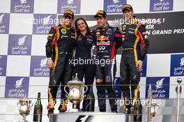 The podium (L to R): Kimi Raikkonen (FIN) Lotus F1 Team, second; Gill Jones (GBR) Red Bull Racing Electronics; Sebastian Vettel (GER) Red Bull Racing, race winner; Romain Grosjean (FRA) Lotus F1 Team, third. 21.04.2013. Formula 1 World Championship, Rd 4, Bahrain Grand Prix, Sakhir, Bahrain, Race Day