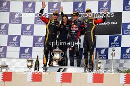 The podium (L to R): Kimi Raikkonen (FIN) Lotus F1 Team, second; Gill Jones (GBR) Red Bull Racing Electronics; Sebastian Vettel (GER) Red Bull Racing, race winner; Romain Grosjean (FRA) Lotus F1 Team, third. 21.04.2013. Formula 1 World Championship, Rd 4, Bahrain Grand Prix, Sakhir, Bahrain, Race Day