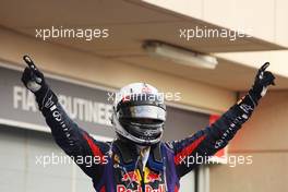 Race winner Sebastian Vettel (GER) Red Bull Racing celebrates in parc ferme. 21.04.2013. Formula 1 World Championship, Rd 4, Bahrain Grand Prix, Sakhir, Bahrain, Race Day