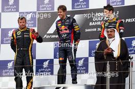 The podium (L to R): Kimi Raikkonen (FIN) Lotus F1 Team, second; Sebastian Vettel (GER) Red Bull Racing, race winner; Romain Grosjean (FRA) Lotus F1 Team, third. 21.04.2013. Formula 1 World Championship, Rd 4, Bahrain Grand Prix, Sakhir, Bahrain, Race Day