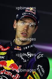 Race winner Sebastian Vettel (GER) Red Bull Racing in the FIA Press Conference. 21.04.2013. Formula 1 World Championship, Rd 4, Bahrain Grand Prix, Sakhir, Bahrain, Race Day