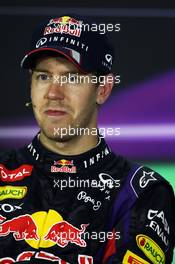 Race winner Sebastian Vettel (GER) Red Bull Racing in the FIA Press Conference. 21.04.2013. Formula 1 World Championship, Rd 4, Bahrain Grand Prix, Sakhir, Bahrain, Race Day