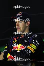 Race winner Sebastian Vettel (GER) Red Bull Racing in the FIA Press Conference. 21.04.2013. Formula 1 World Championship, Rd 4, Bahrain Grand Prix, Sakhir, Bahrain, Race Day