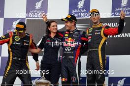 The podium (L to R): Kimi Raikkonen (FIN) Lotus F1 Team, second; Gill Jones (GBR) Red Bull Racing Electronics; Sebastian Vettel (GER) Red Bull Racing, race winner; Romain Grosjean (FRA) Lotus F1 Team, third. 21.04.2013. Formula 1 World Championship, Rd 4, Bahrain Grand Prix, Sakhir, Bahrain, Race Day