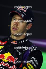 Race winner Sebastian Vettel (GER) Red Bull Racing in the FIA Press Conference. 21.04.2013. Formula 1 World Championship, Rd 4, Bahrain Grand Prix, Sakhir, Bahrain, Race Day