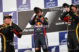 The podium (L to R): Kimi Raikkonen (FIN) Lotus F1 Team, second; Sebastian Vettel (GER) Red Bull Racing, race winner; Romain Grosjean (FRA) Lotus F1 Team, third. 21.04.2013. Formula 1 World Championship, Rd 4, Bahrain Grand Prix, Sakhir, Bahrain, Race Day